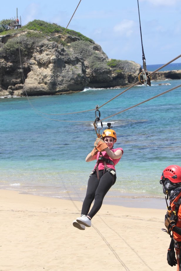 Me ziplining during the Zip & Zoom cruise excursion