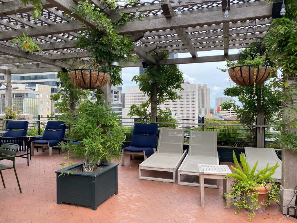 Seating by the rooftop pool of the Ace Hotel in New Orleans 