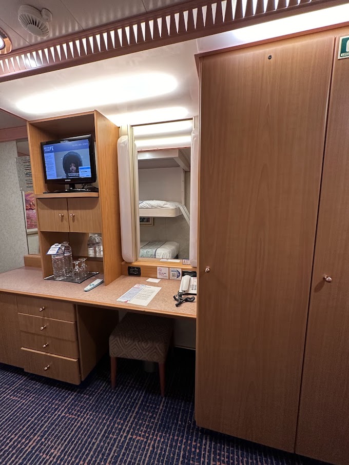 Television and makeup mirror in the Carnival Freedom Interior Upper/Lower Cabin