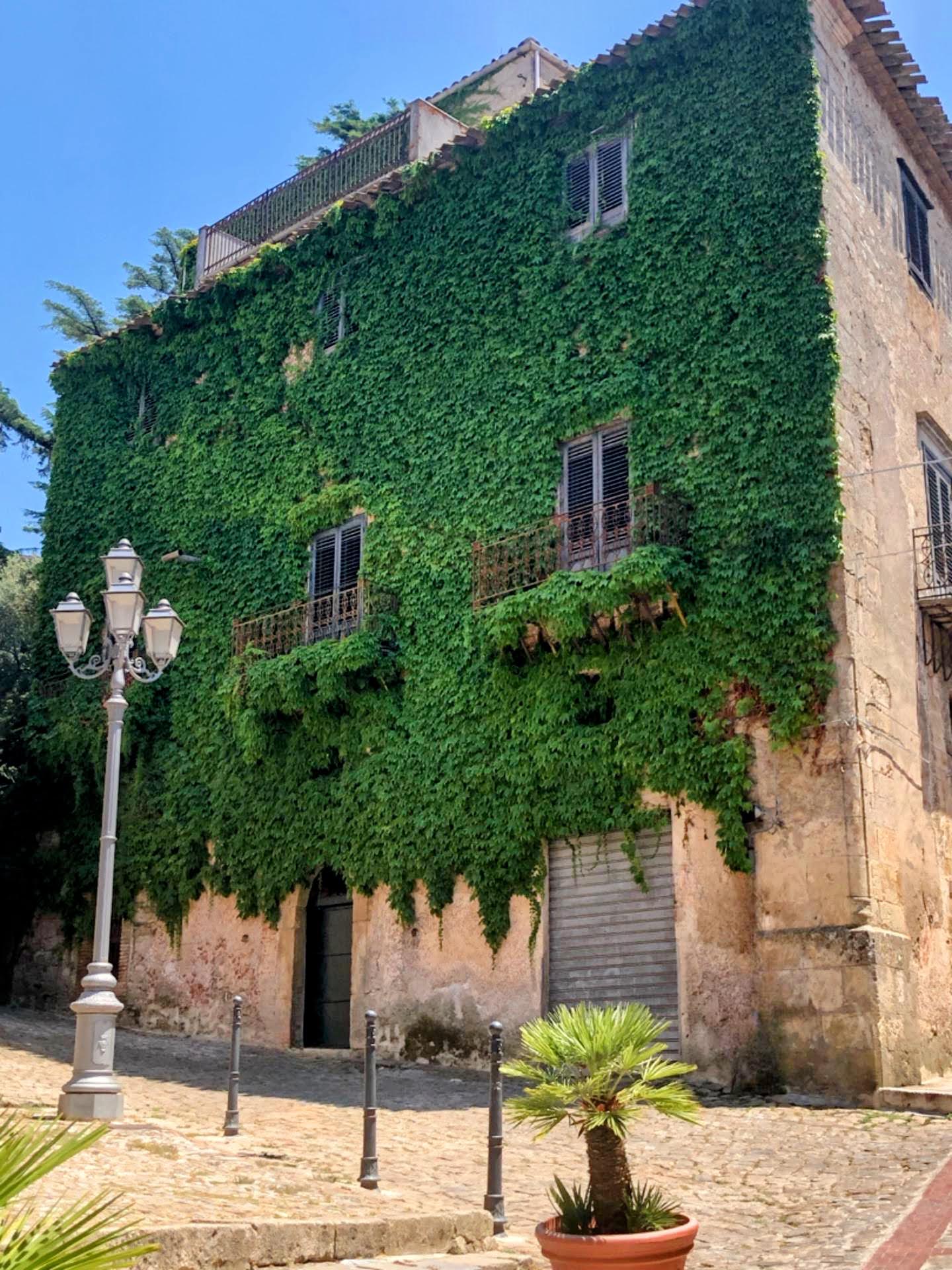 Building with moss in Polizzi Generosa - a hidden gem of Sicily, Italy