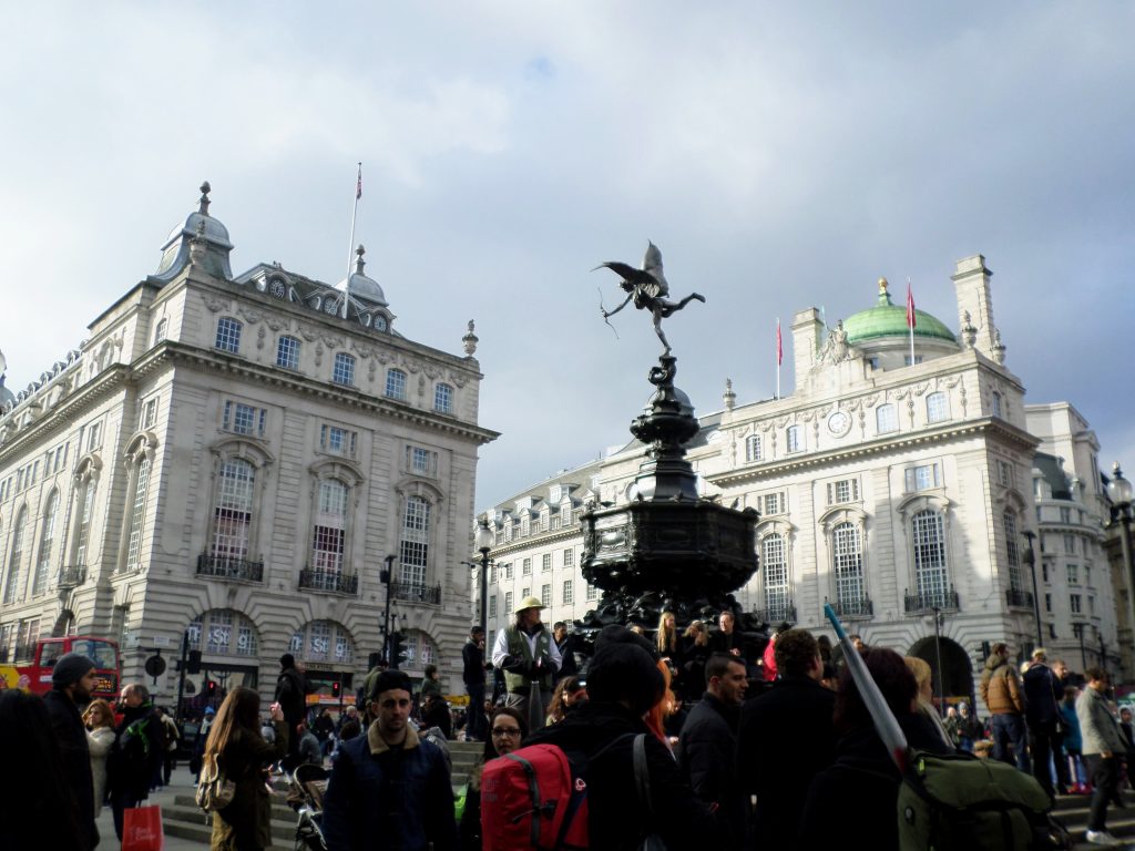 Picture of the center of Piccadilly Circus in London showing one of its famous statues.