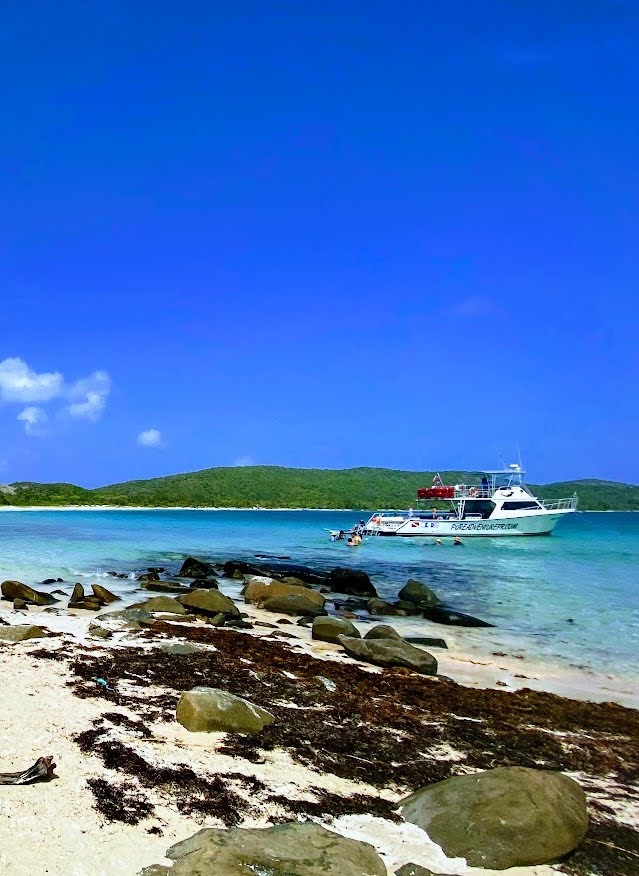 Picture of a speedboat on the water of Flamenco Beach in Culebra, Puerto Rico. 