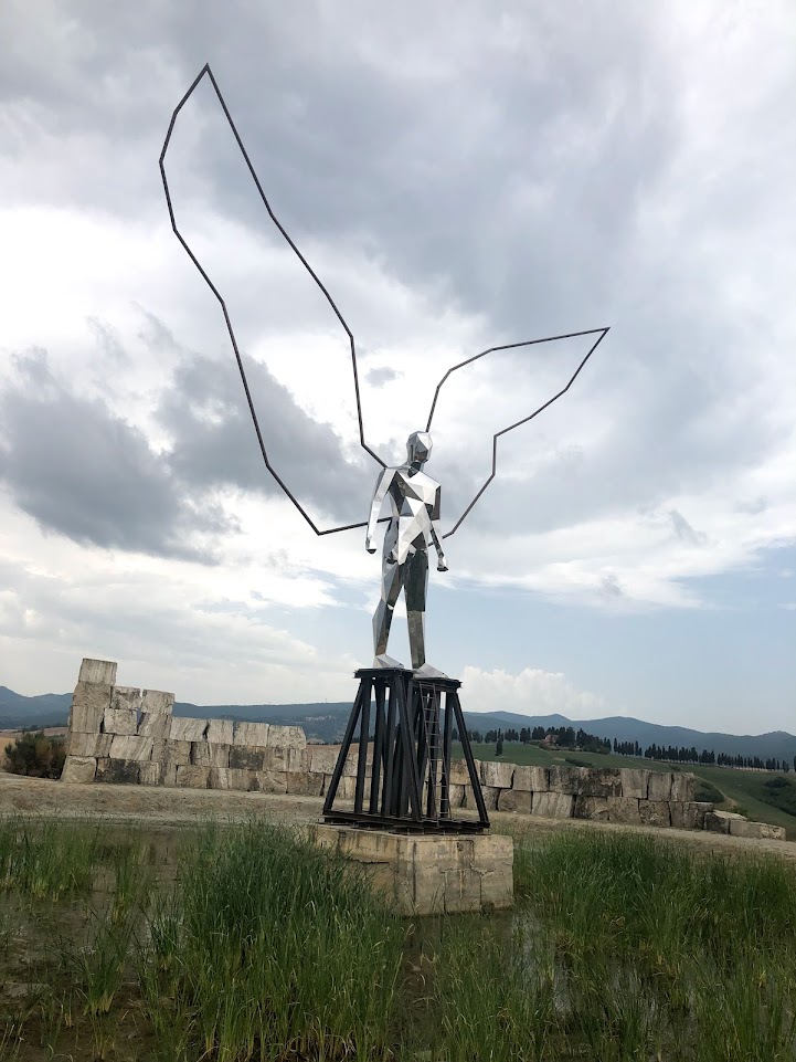 Picture of a sculpture in the countryside of Lajatico. 