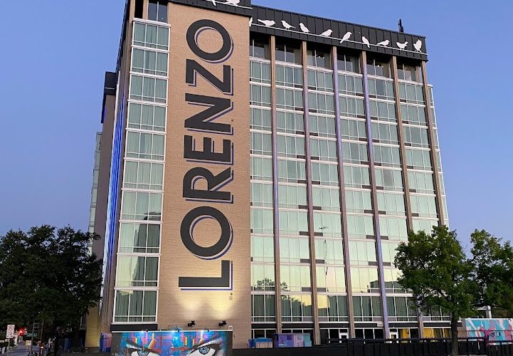 View of the outside of the Lorenzo Hotel in Dallas from the road